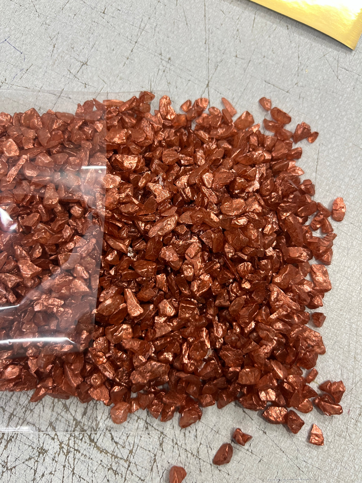 Bronze dyed stone