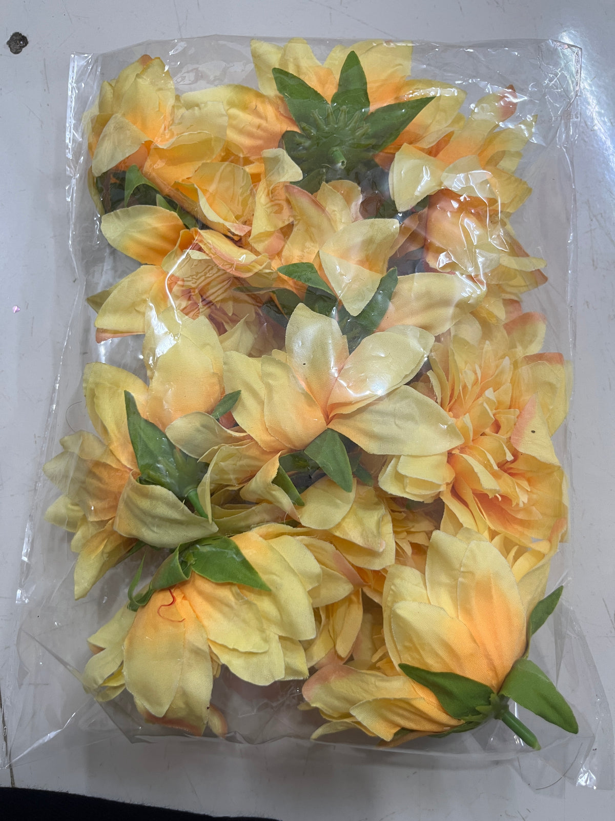 Artificial decorative flower (yellow)