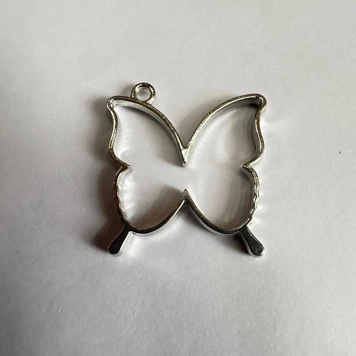 Silver butterfly bezel
